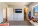 ' bedroom with carpet, a TV, and access to the closet at 3309 Green Ice Ave, North Las Vegas, NV 89081
