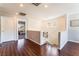 Upstairs hallway with hardwood floors and ample natural light at 3309 Green Ice Ave, North Las Vegas, NV 89081