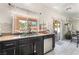 Bright kitchen featuring stainless steel appliances and a window overlooking the pool at 3309 Green Ice Ave, North Las Vegas, NV 89081