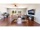 Spacious living room with hardwood floors, comfortable seating, and a view of the outdoors at 3309 Green Ice Ave, North Las Vegas, NV 89081