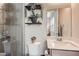 Chic bathroom with a tiled shower, marble countertop, and natural accents at 3395 Sleeping Hills Ave, Henderson, NV 89044