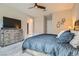 Comfortable bedroom with ample storage in dresser and calming natural light at 3395 Sleeping Hills Ave, Henderson, NV 89044