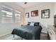 Comfortable bedroom with neutral tones, and a view of the neighborhood at 3395 Sleeping Hills Ave, Henderson, NV 89044