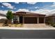 Charming single-story home featuring a brick-accented facade, desert landscaping, and a spacious two-car garage at 3395 Sleeping Hills Ave, Henderson, NV 89044
