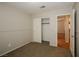 Bedroom featuring neutral walls, carpet, and closet with sliding doors at 3416 Steppe St, North Las Vegas, NV 89032