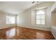Large bedroom featuring a ceiling fan and windows at 3416 Steppe St, North Las Vegas, NV 89032