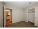 Bedroom leading to bathroom with view of vanity and closet at 3416 Steppe St, North Las Vegas, NV 89032