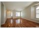 Bright, airy living room featuring hardwood floors and an ornate front door at 3416 Steppe St, North Las Vegas, NV 89032