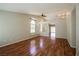 Bright living room featuring wood floors and ceiling fan at 3416 Steppe St, North Las Vegas, NV 89032