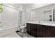 Well-maintained bathroom features a shower-tub combo and modern vanity with ample counter space at 3517 Arcadian King Ave, Las Vegas, NV 89106