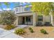 Charming two-story home with landscaped yard and inviting front porch, perfect for enjoying the outdoors at 3517 Arcadian King Ave, Las Vegas, NV 89106