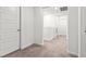 Hallway with neutral carpet and white walls at 3517 Arcadian King Ave, Las Vegas, NV 89106