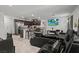 Spacious open-concept living area with an island leading to the kitchen, great for gatherings at 3517 Arcadian King Ave, Las Vegas, NV 89106