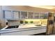 Modern kitchen with white cabinets, stainless steel appliances and decorative elements at 3722 Las Vegas Blvd # 809, Las Vegas, NV 89158