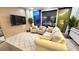 Bright and spacious living space with comfortable seating and floor to ceiling glass at 3722 Las Vegas Blvd # 809, Las Vegas, NV 89158