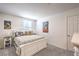 Bright bedroom features comfortable decor and neutral walls at 4145 Nopal Serrano Ave, Las Vegas, NV 89141