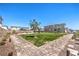 Charming community park with benches, mature trees, and picturesque walkways at 4145 Nopal Serrano Ave, Las Vegas, NV 89141