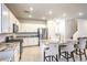 Modern kitchen with stainless steel appliances and a large island at 4145 Nopal Serrano Ave, Las Vegas, NV 89141
