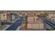 An aerial view of neighborhood streets, rooftops, sidewalks, landscaping, and residential homes at 4153 Solace St, Las Vegas, NV 89135