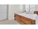 Inviting bedroom features a plush bed, soft neutral carpet, bright blinds, and closet space at 4153 Solace St, Las Vegas, NV 89135