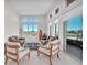 Bright, airy living room with high ceilings, large windows, and mountain views at 4153 Solace St, Las Vegas, NV 89135