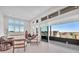 Bright living room with balcony access offering panoramic views at 4153 Solace St, Las Vegas, NV 89135