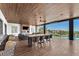Expansive outdoor patio boasts a cozy fireplace, comfortable seating, dining area, and scenic views at 4153 Solace St, Las Vegas, NV 89135