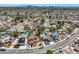 Discover this fantastic property showcasing a large pool, cozy yard, and other surrounding homes at 4302 Newhaven Dr, Las Vegas, NV 89147