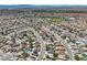 Sprawling community showing well-maintained homes, mature trees, and orderly street layouts, close to a baseball field and other amenities at 4302 Newhaven Dr, Las Vegas, NV 89147