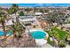 The aerial view showcases the home with pool, well-kept lawn, and charming backyard firepit at 4302 Newhaven Dr, Las Vegas, NV 89147