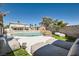 Backyard view featuring a swimming pool, lounge seating and a patio at 4302 Newhaven Dr, Las Vegas, NV 89147