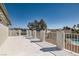 Large deck with a view overlooking palm trees and the community pool at 4302 Newhaven Dr, Las Vegas, NV 89147