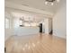 Bright and airy living room with hardwood floors and a seamless flow into the kitchen at 4302 Newhaven Dr, Las Vegas, NV 89147