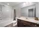 Bathroom features a shower-tub combination, a vanity sink, and modern fixtures at 4650 Ranch House Rd # 86, North Las Vegas, NV 89031
