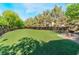Fully fenced dog park featuring green space and shade trees at 4650 Ranch House Rd # 86, North Las Vegas, NV 89031