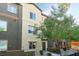 Charming townhome showcasing two-story architecture and front yard landscaping at 4650 Ranch House Rd # 86, North Las Vegas, NV 89031