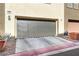 Attached garage with driveway parking; unit number 86 at 4650 Ranch House Rd # 86, North Las Vegas, NV 89031