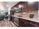 Well-equipped kitchen featuring granite countertops, stainless steel appliances, and modern cabinets at 4650 Ranch House Rd # 86, North Las Vegas, NV 89031