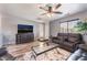 Comfortable living room featuring a ceiling fan, TV, and modern furnishings at 4650 Ranch House Rd # 86, North Las Vegas, NV 89031