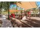 Community playground has shaded structures, slides, and climbing structures at 4650 Ranch House Rd # 86, North Las Vegas, NV 89031