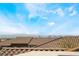 A rooftop showcases tile roofs, and distant city skyline views at 4650 Ranch House Rd # 86, North Las Vegas, NV 89031