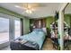 Spacious bedroom with ceiling fan, exterior access and mirrored closet at 513 Berry Cir, Las Vegas, NV 89107