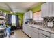 Kitchen with ample counter space, bright lighting and a window offering natural light at 513 Berry Cir, Las Vegas, NV 89107