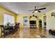 Open floor plan with living area with laminate flooring, dining area and access to kitchen at 513 Berry Cir, Las Vegas, NV 89107