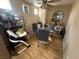 Dining area with round table, upholstered chairs, and decorative wall art at 5281 Starter Ave, Las Vegas, NV 89156