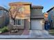 Charming two-story home with attached garage and manicured front yard at 5281 Starter Ave, Las Vegas, NV 89156