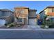 Inviting two-story home with manicured lawn and cozy curb appeal at 5281 Starter Ave, Las Vegas, NV 89156