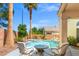 Backyard pool with spa surrounded by mature landscaping and a serene setting at 5421 Tourmaline St, Las Vegas, NV 89130