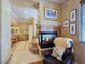 Luxury bathroom with tiled floors, stone fireplace, and elegant vanity area at 5445 Pendini Point Ct, Las Vegas, NV 89141