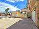 Spacious three-car garage with ample driveway space in a well-maintained neighborhood at 5445 Pendini Point Ct, Las Vegas, NV 89141